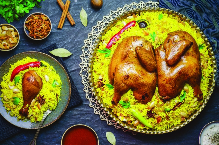 Can you find any influences from Kuwaiti Bedouin or Gulf Arab traditions in the cuisine?