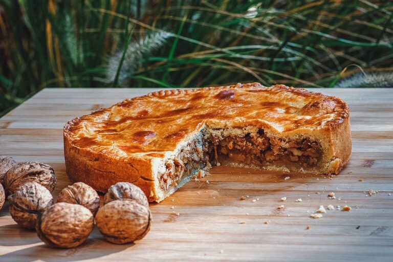 How is Swiss cuisine influenced by French, German, and Italian cuisines?