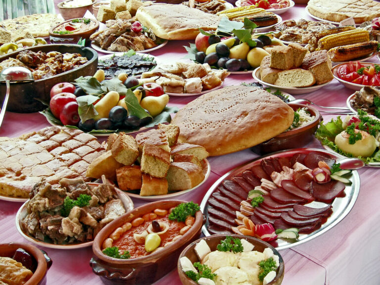 What is the significance of ajvar in Serbian cuisine?