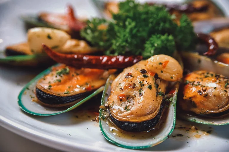 Are there any unique cooking techniques used in New Zealand cuisine?