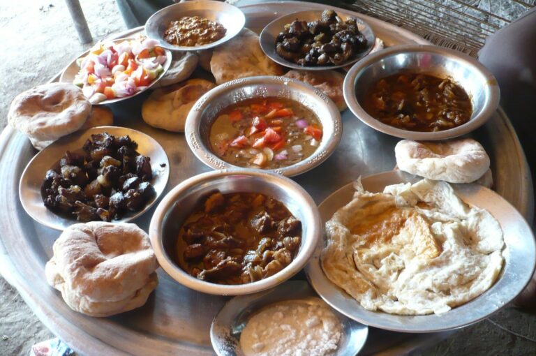 What are some traditional dishes in Sudanese cuisine?