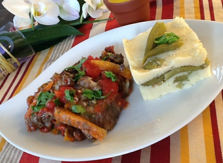 Are there any specific regional variations in Antiguan and Barbudan cuisine?