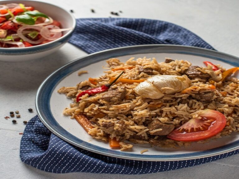 How does Turkmen cuisine differ from other Central Asian cuisines?