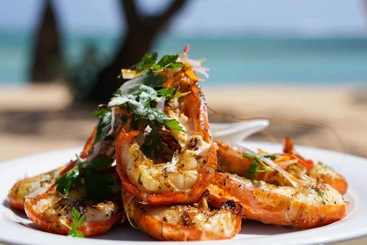 Are there any local snacks or street food delicacies that tourists should try?