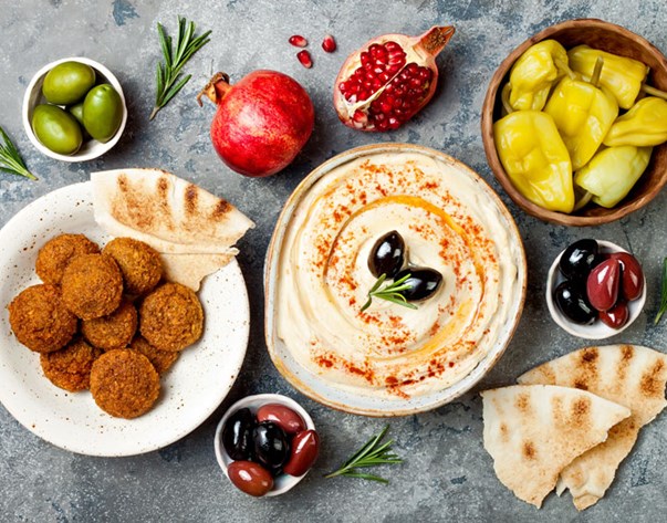 Can you find any influences from Lebanese historical events or civilizations in the cuisine?
