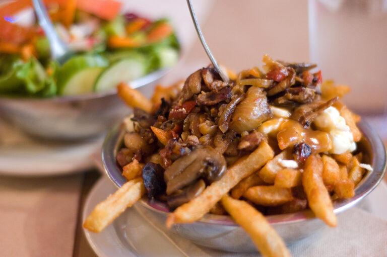 What are some traditional herbs and spices used in Canadian cuisine?