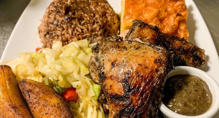 Can you recommend some must-try dishes for someone visiting Jamaica?