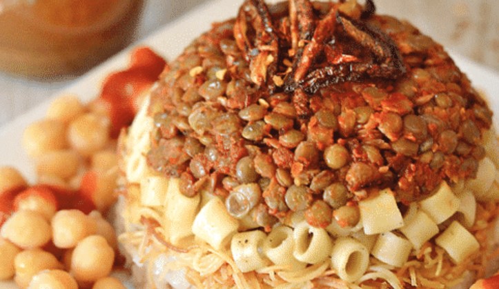 Can you explain the process of making “basbousa,” a traditional Egyptian semolina cake soaked in syrup?