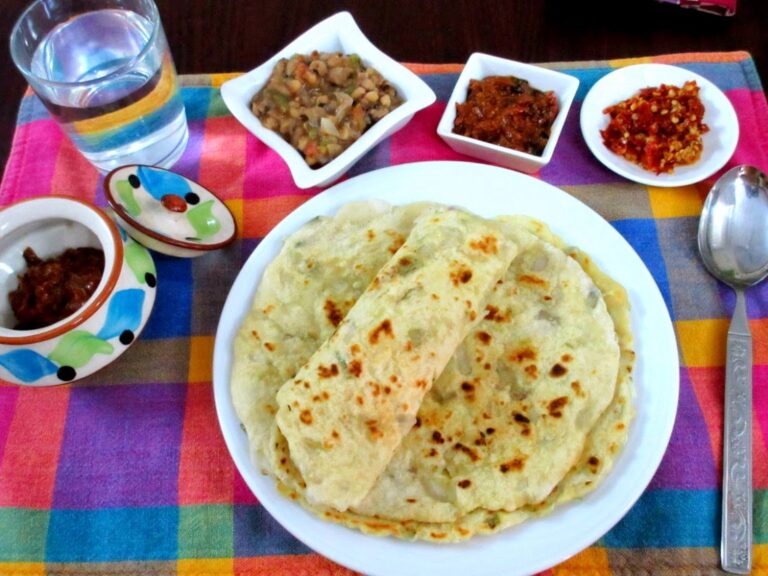 What are some popular condiments or spices used in Zambian cuisine?