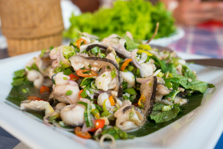Are there any unique ingredients or flavors used in Laotian cooking?