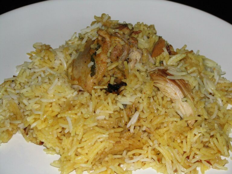 Can you find any influences from Indian or Persian cuisines in Kuwaiti dishes?
