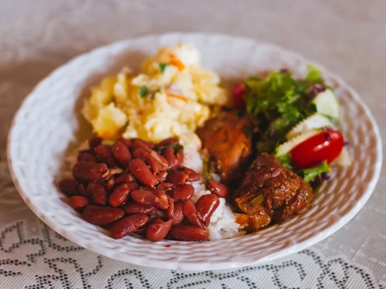 Can you recommend some must-try Trinidadian street food?