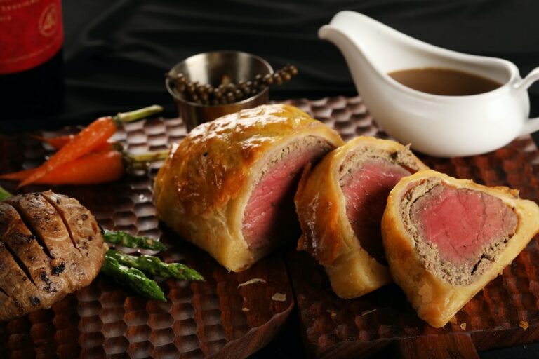 How is British cuisine influenced by other cultures and cuisines?