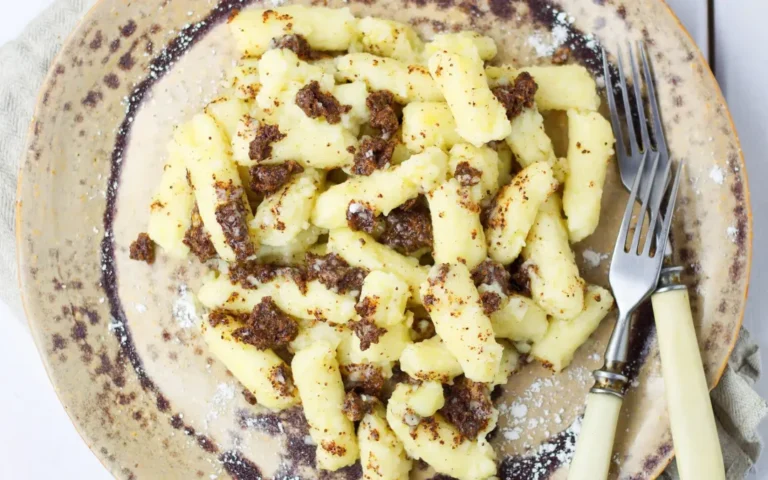 How does Slovak cuisine differ from neighboring Central European cuisines?
