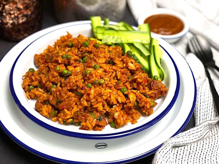 What are the staple ingredients used in Surinamese cooking?