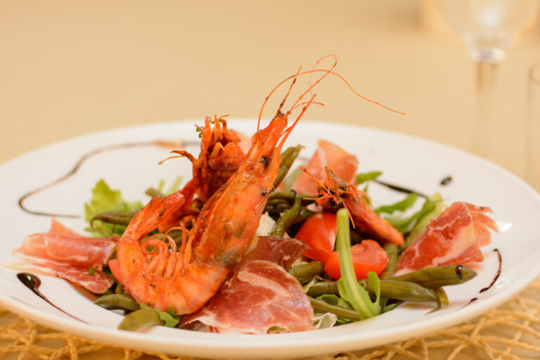 What are some local ingredients commonly used in Andorran cuisine?