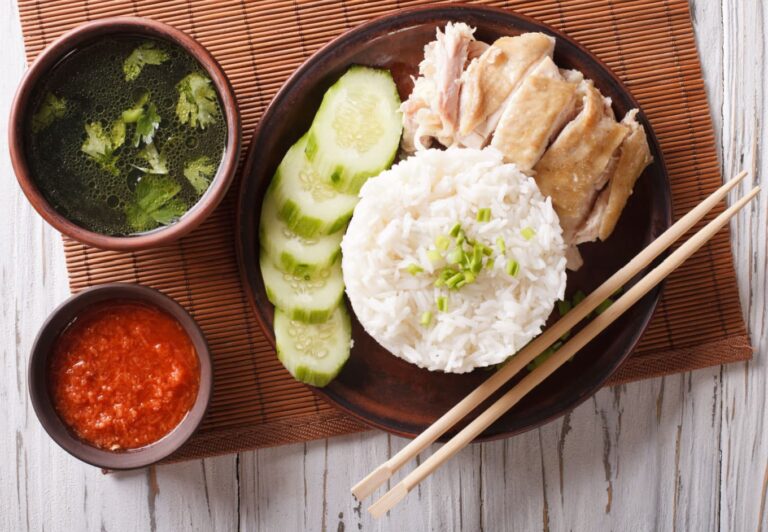 Where can I learn more about Singaporean culinary traditions and experiences?