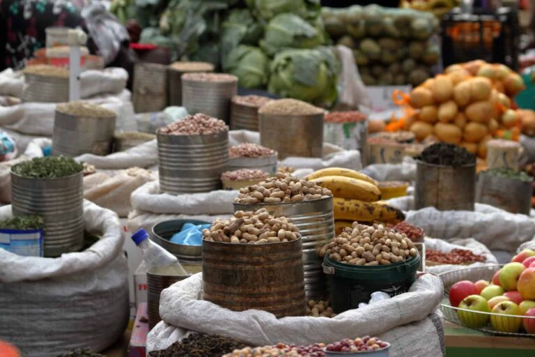 How is street food culture in Zimbabwe different from restaurant cuisine?