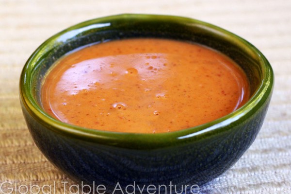 What are some condiments or sauces commonly used in Malian cooking?