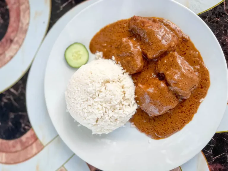 Can you recommend any Gambian street food markets or stalls?