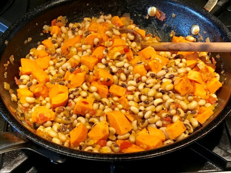 How does Gambian cuisine differ from other West African cuisines?