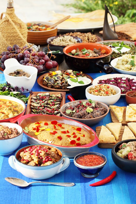 What are the staple ingredients in Georgian meals?
