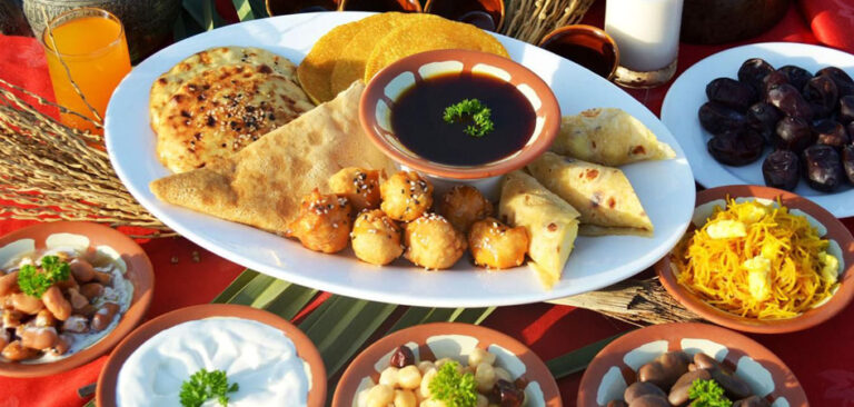 What are the staple ingredients used in Emirati cooking?