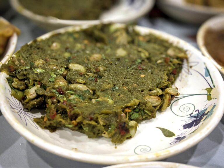 What are some local ingredients commonly used in Bangladeshi cuisine?