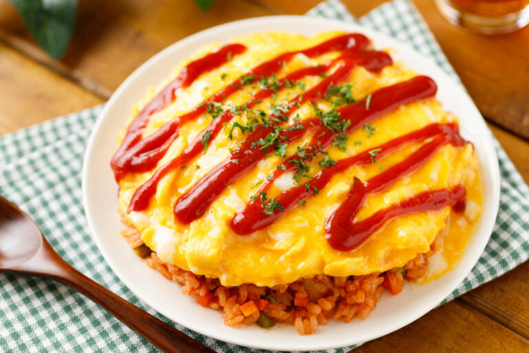 Can you recommend some must-try dishes for someone visiting Japan?