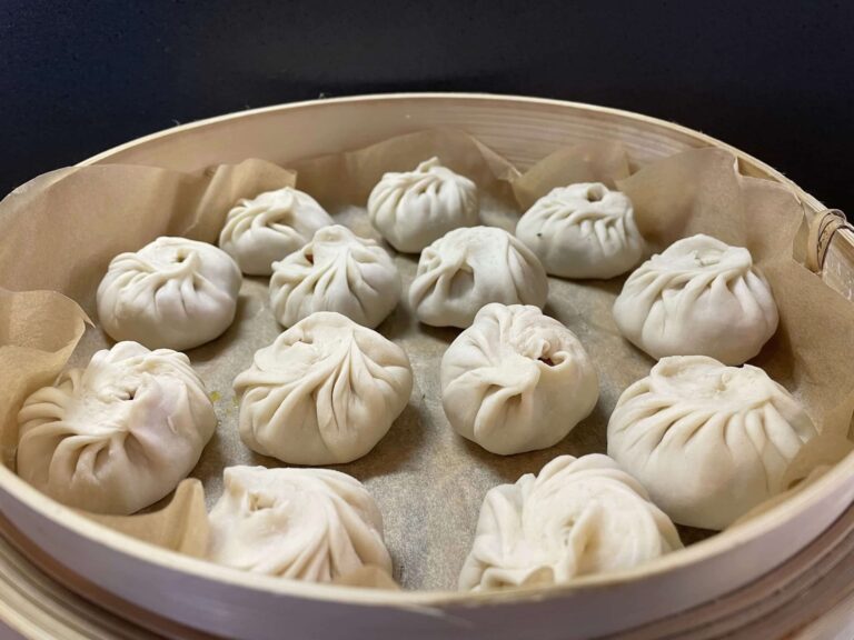 What are the main ingredients used in Mongolian cuisine?