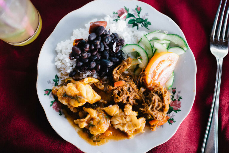 What are the main ingredients used in Cuban dishes?