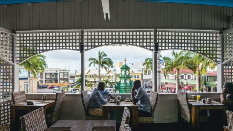 Can you tell me about the influence of local cultural traditions on Saint Kitts and Nevis cuisine?