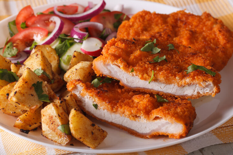 What is currywurst, and how is it prepared?