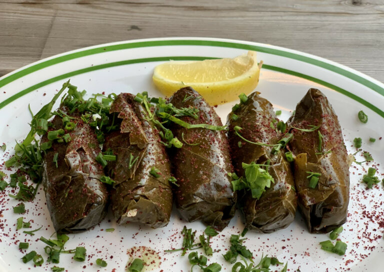 What are the staple ingredients in Greek meals?