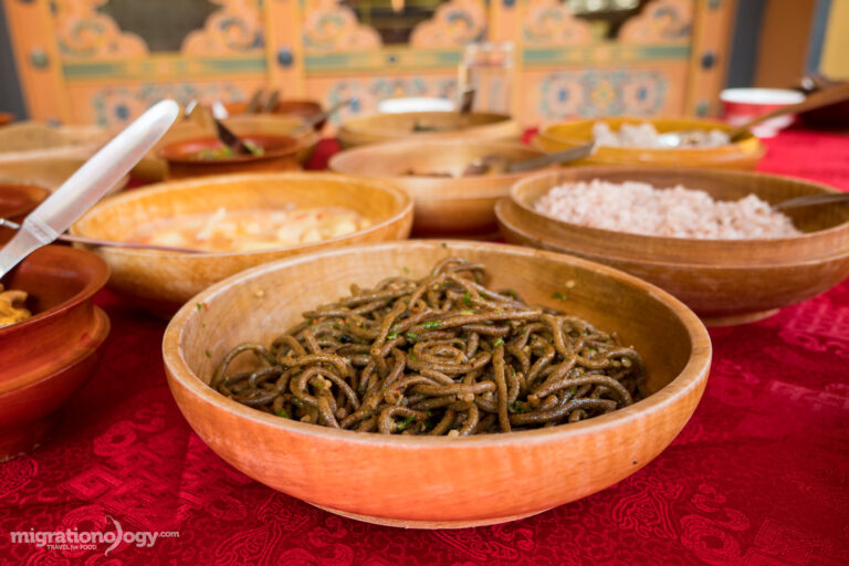 How is Bhutanese cuisine different from other South Asian cuisines?