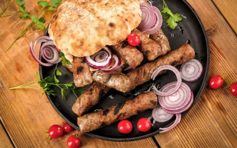 Are there any specific etiquette or customs associated with Bosnian dining?