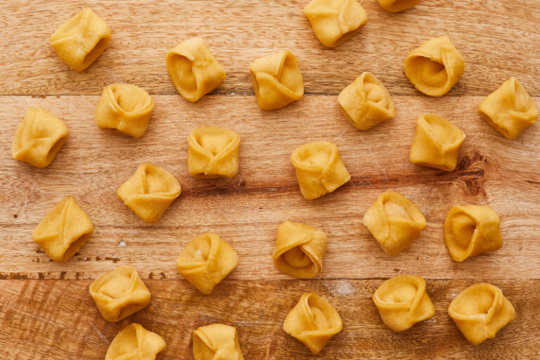 Can you tell me about the influences on San Marino cuisine from Italian and regional traditions?