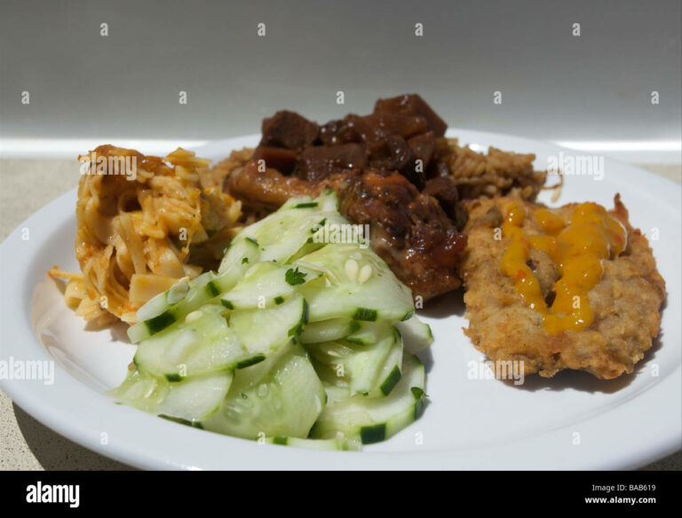 What is Barbadian cuisine known for?