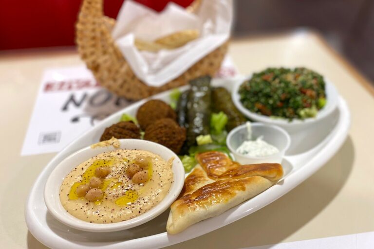 Can you find any influences from neighboring countries in Lebanese cuisine?