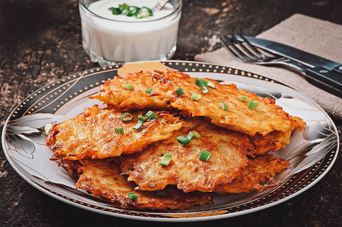 Can you find any influences from Latvian agricultural practices or seasonal ingredients in the cuisine?