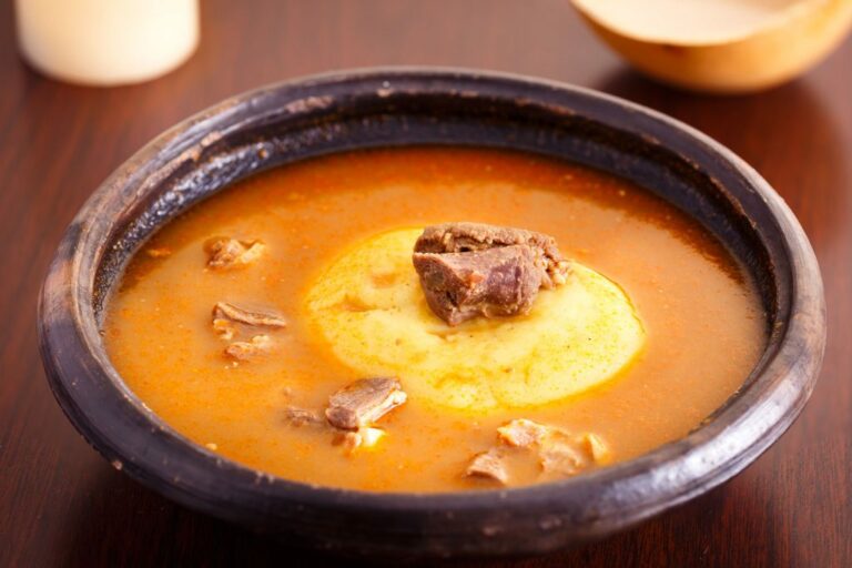 What are the staple ingredients in Ghanaian meals?