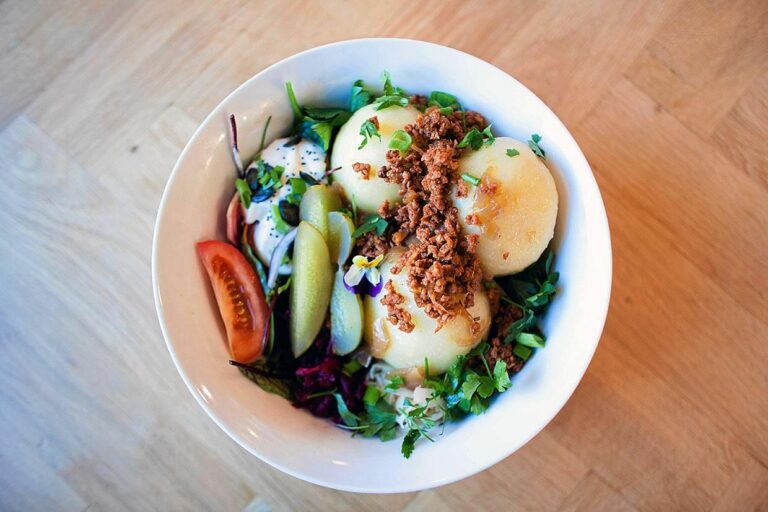 Can you suggest some Polish dishes that are suitable for those with dietary restrictions, such as gluten-free or vegetarian options?