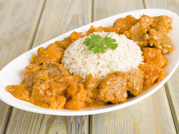 What are the main seafood dishes in Barbadian cuisine?