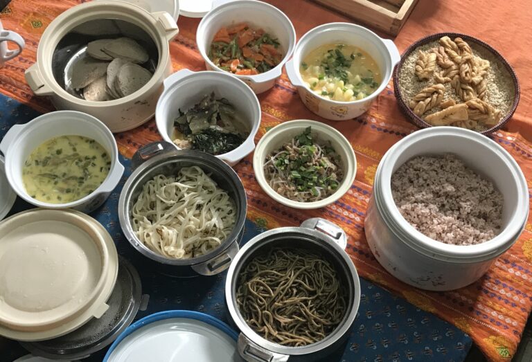 Can you recommend some typical Bhutanese dishes for a first-time visitor?