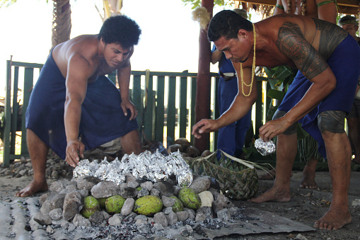Are there any unique cooking techniques used in Samoan cuisine?