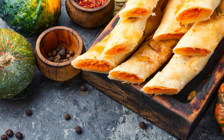 How do Moldovan people typically eat their meals? Are there any customs or traditions?