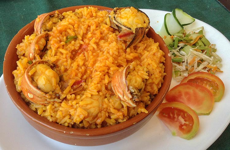 Are there any signature dishes in Cuban cuisine?