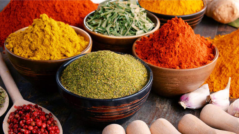 What are some common spices and herbs used in Rwandan cooking?