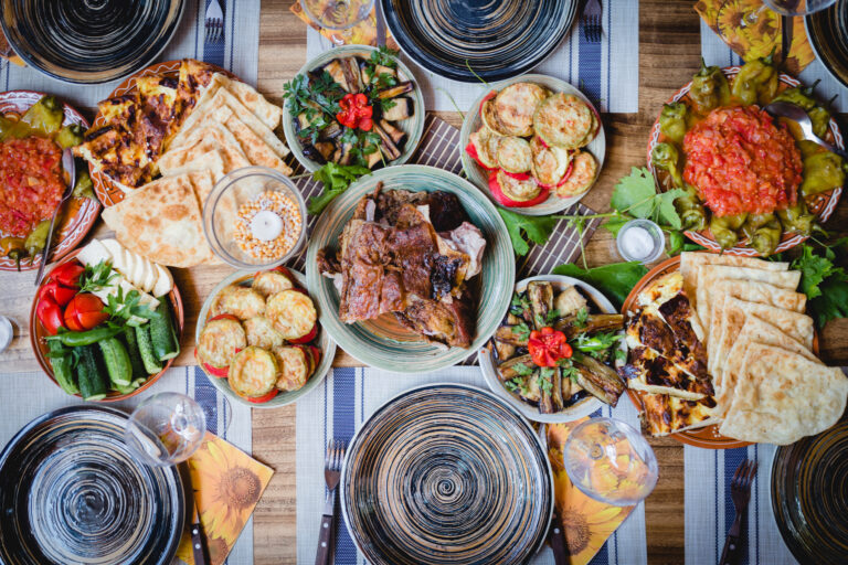 How is Moldovan food influenced by its history and culture?