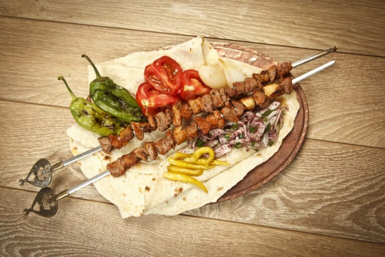 Can you explain the concept of “meze” in Cypriot cuisine?
